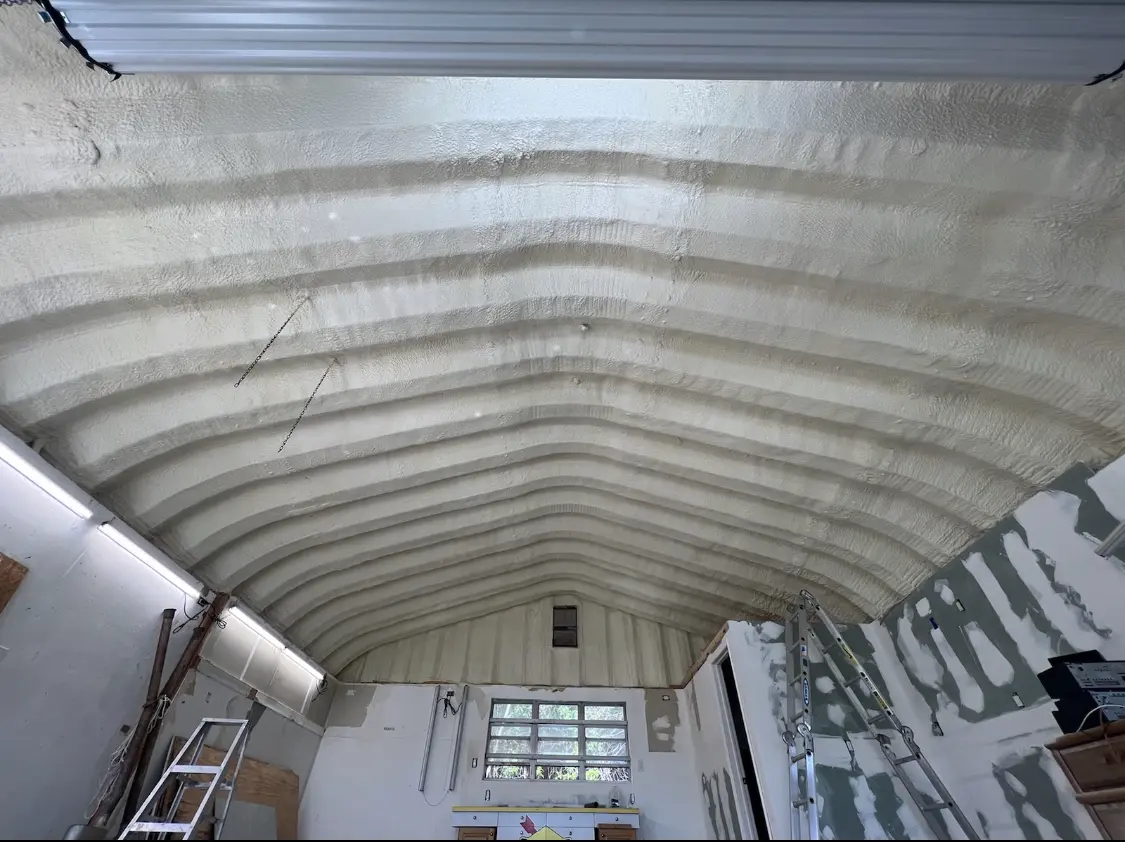Spray polyurethane foam applied to the underside of a metal roof deck in Arden-Arcade